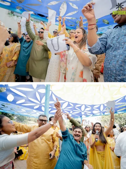 The pure energy of a Haldi celebration. Guests cheering and participating in games, creating a lively and joyous atmosphere that is truly contagious.