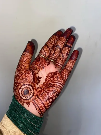 A rich, dark stain from a party mehendi design, showing great color on the palm.