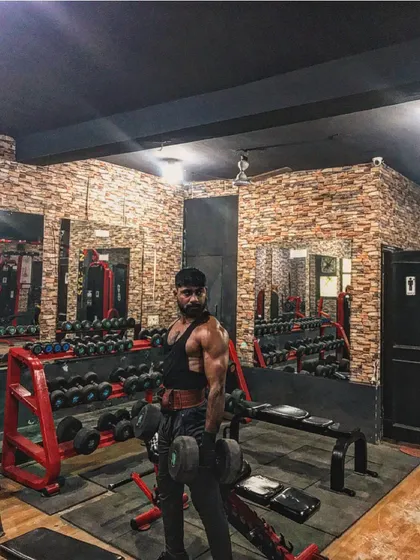 Men of steel. Getting ready for some heavy dumbbell work.