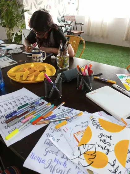 A quiet moment of focus during a calligraphy and illustration workshop. I provide all the pens, paper, and guidance needed to help you find your creative flow in a calm and inspiring setting.