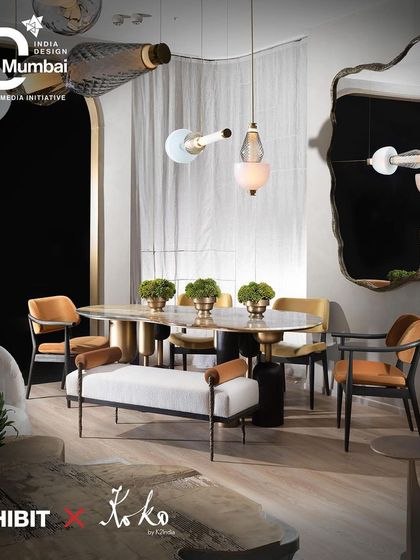 Our Koko furniture collection is about the blend of aesthetic beauty and practical design. This vignette from our India Design ID exhibit features our sculptural dining table, elegant chairs, and a unique bench, all designed to enhance a space with form and function.