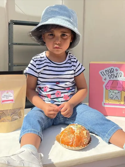 This little one is ready to dig into a Korean Cream Cheese Bun. My bakes are loved by customers of all ages.