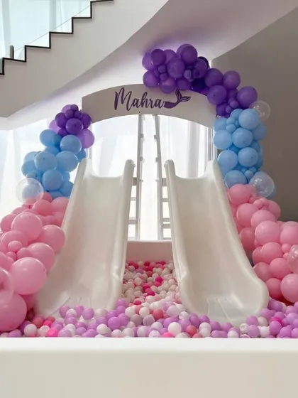 We believe parties should be filled with laughter and energy. This custom ball pit with dual slides is one of our most popular rentals, creating a safe and exciting centerpiece for any kids' birthday party or family event.