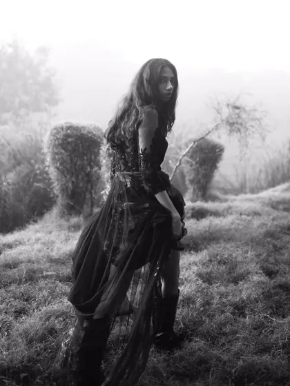 A black and white editorial shot taken on a foggy December day. I styled this dramatic lace and tulle gown to create a gothic, romantic mood, with the misty landscape adding to the noir feel.