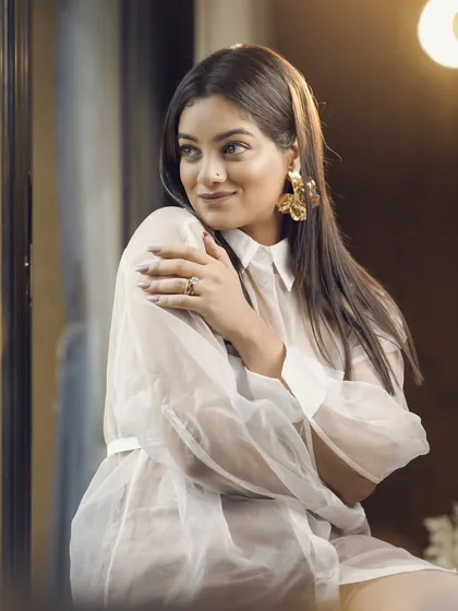 A warm, colored version of a similar pose, showing how lighting can change the mood completely.