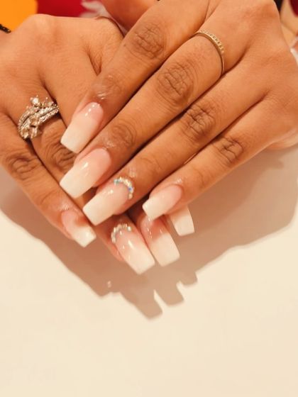 Another view of this timeless ombre French set, showing how the delicate rhinestones catch the light.