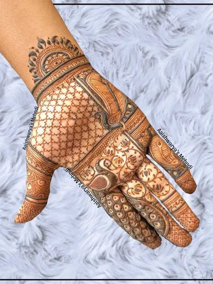 A stylish back-hand design with a mix of checks, floral patterns, and an elephant motif. It's a modern take on traditional elements.