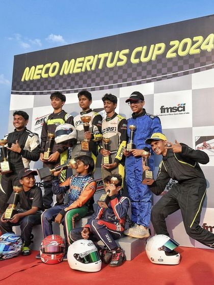 The entire grid of winners from the Meritus Cup, with our drivers standing tall. Moments like these celebrate the spirit of competition and the success of all the young racers.
