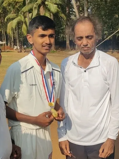 Tanmay Jagtap wearing his medal after a brilliant bowling spell of 5 wickets for just 8 runs in the U-19 GKP Fanse Trophy.