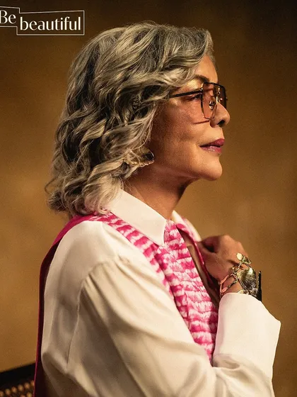 A close-up of a styling look for Zeenat Aman, featuring a beautiful pink overlay from Studio Medium. The focus here was on texture, color, and statement jewelry to create a sophisticated and modern portrait.