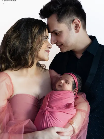 The beginning of a new chapter. I love to photograph the unspoken connection between new parents as they hold their precious baby, their whole world in their arms.
