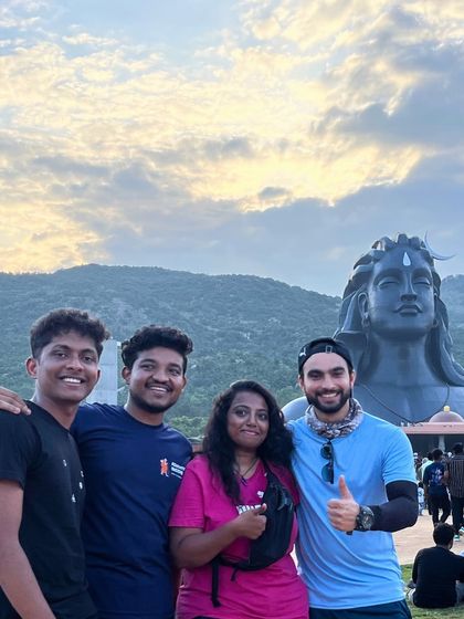 Our team and travelers at the Adiyogi statue, a place of immense spiritual energy.