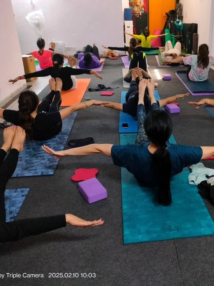 Another view of our core strengthening work. Notice how everyone is at a different level, which is perfectly welcome in my classes. We focus on progress, not perfection.