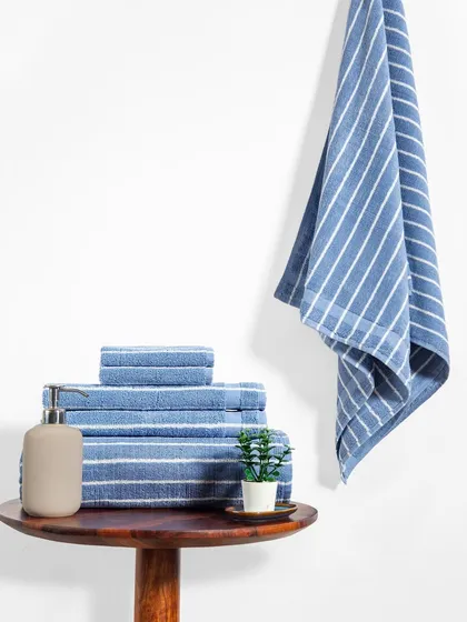 This is the same clean and simple product shot, showcasing the blue towel set. The consistent styling helps create a cohesive look for a product line with multiple color options.