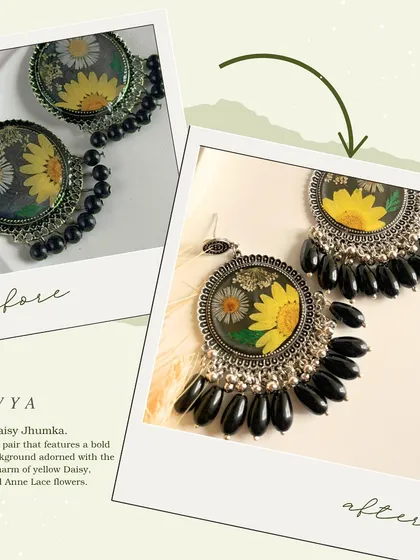 My Navya jhumkas, featuring yellow daisy and aster flowers, have been redesigned. I have updated the look to be more premium and elegant, with bolder black beads, while keeping the same price.