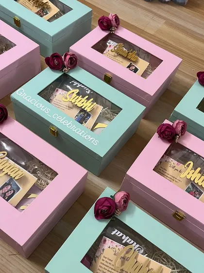 Asking your best friends to be your bridesmaids is a huge moment. I create these beautiful personalized proposal boxes in lovely pastel shades. Each box has a custom name cutout, a personal photo, and is filled with treats to show your girls how much they mean to you.