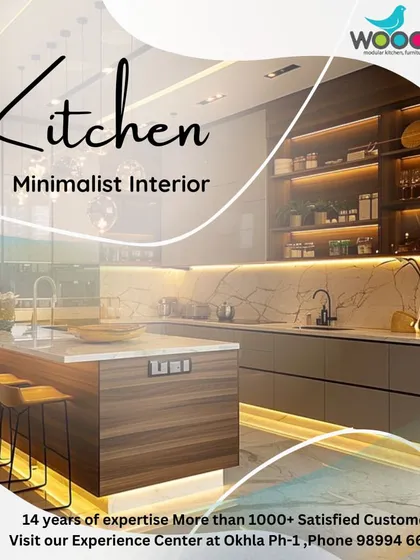 A kitchen is more than just a place to cook; it's the heart of the home. This minimalist kitchen design features a large island with seating, making it a perfect spot for the family to gather. We used a mix of wood textures and neutral tones to create a warm and inviting space.