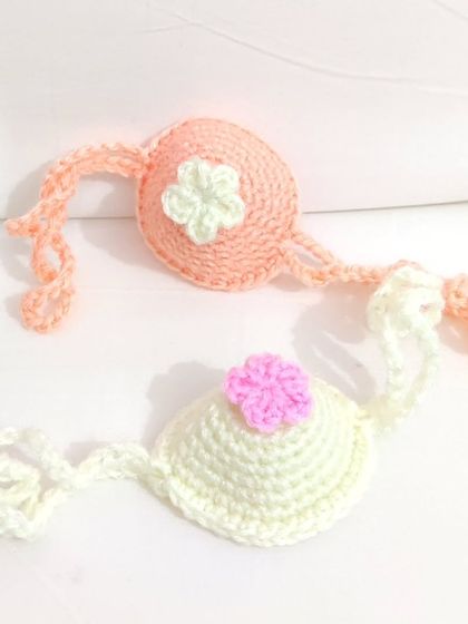 My funkiest creation yet, crochet nose warmers. I made these on a custom request in cute bear and flower designs.