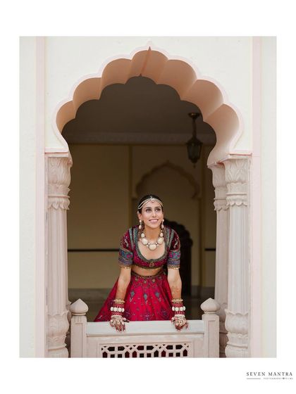 Framed perfectly within the arch, this portrait has a beautiful symmetry and sense of peace.