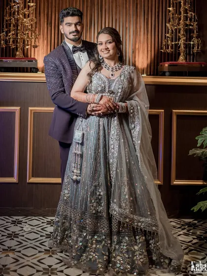 Glamour and elegance for the reception. Here, I created a sophisticated evening look for the couple, featuring a sparkling lehenga, soft wavy hair, and makeup that shines under the lights.