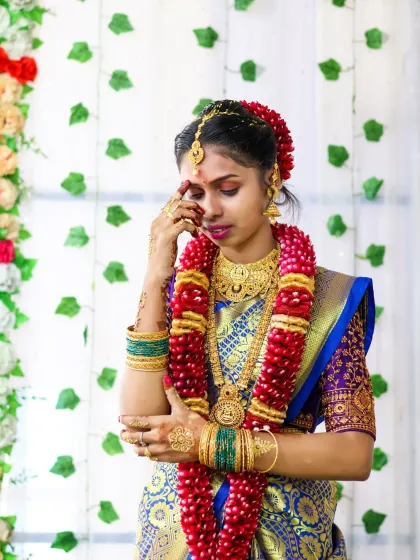 An emotional and candid shot from a puberty ceremony. This quiet, reflective moment is just as important to capture as the smiling portraits, telling a deeper story of the day.