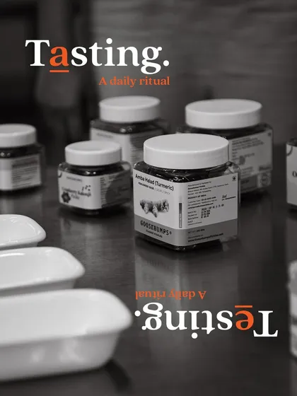 Jars lined up for our daily tasting ritual. This commitment to quality control is at the core of what we do.