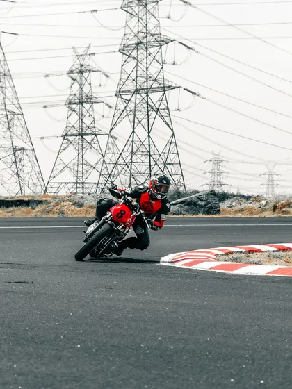 A rider cornering on a GT 650 at the CoASTT track.