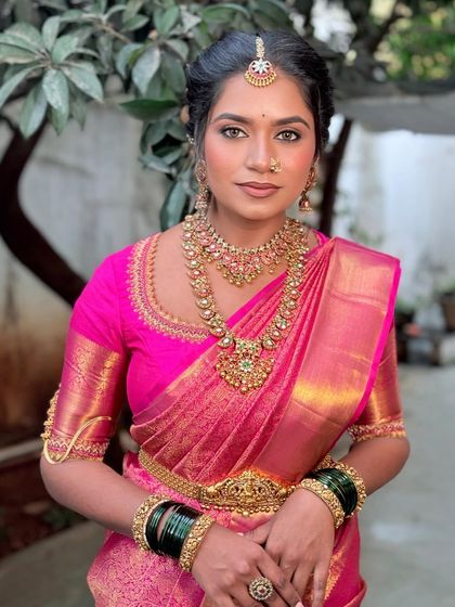 The perfect engagement look. The soft glam makeup enhances her features beautifully without overpowering her natural charm.