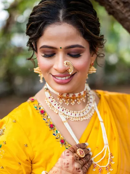 A close-up on the beautiful, soft-glam eye makeup and the traditional Maharashtrian nath, a perfect blend of modern and classic.