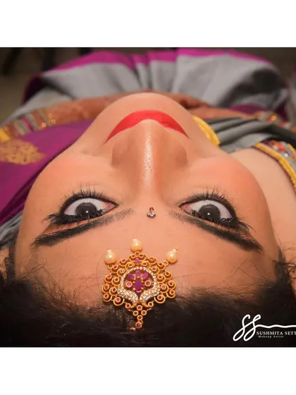 A stunning close up that captures the sharp winged liner and bright, open eyes. This is a perfect example of how I create a look that is both traditional and modern.