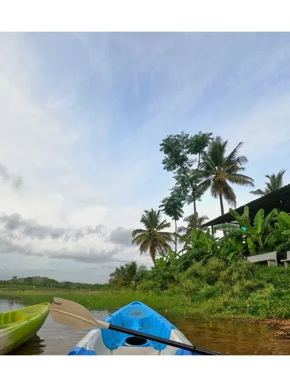 The front of a kayak points towards the shore, showing the close proximity of our camp to the water.