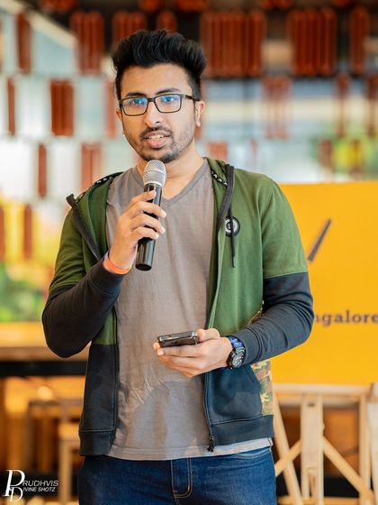 A poet at our "Vulnerabilities" meetup. The event included a book launch, storytelling, and poetry recitations.