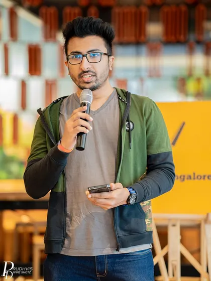 A poet at our "Vulnerabilities" meetup. The event included a book launch, storytelling, and poetry recitations.