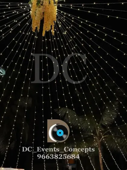 A close-up of a fairy light canopy, showing the dense web of lights that creates a magical, starry night effect for any evening event.