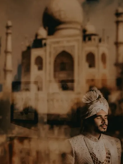 A creative double exposure portrait combining the groom with the iconic Taj Mahal, symbolizing a love as timeless as the monument itself.