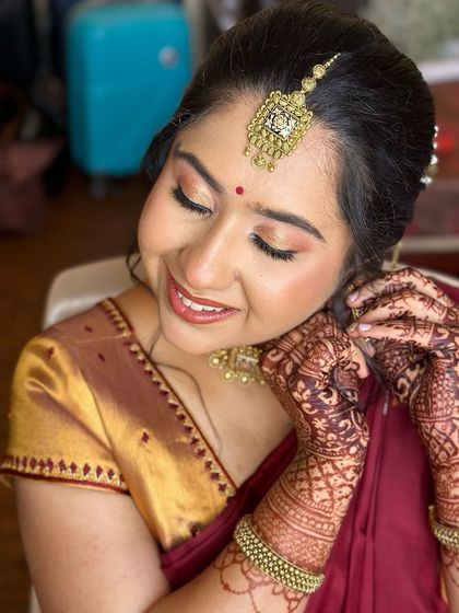 A doll-like portrait of this bride-to-be, her engagement makeup is soft, peachy, and absolutely glowing.