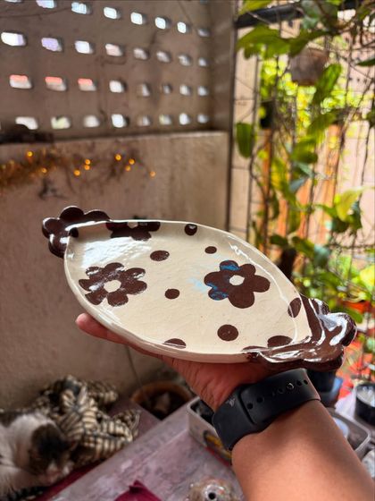 This Nerikomi tray with a simple floral pattern was made by a beginner student. Her patience and focus on the process resulted in such a beautiful, clean piece.