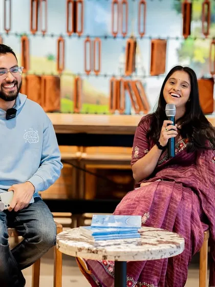 The smiles say it all. A moment of shared happiness between the author and host during the "Wheel of Life" book launch.