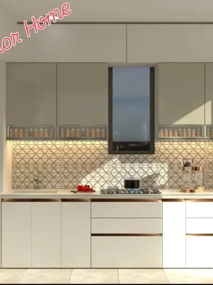 The geometric-patterned backsplash is the highlight of this kitchen, complemented by neutral-toned cabinets and under-cabinet lighting.