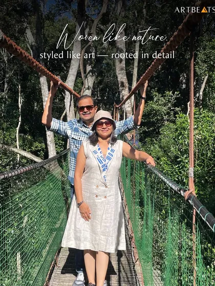 Woven like nature, styled like art. A client wears the Call of the Pharaohs blazer dress on a canopy bridge, showing how my designs are rooted in detail and made for adventure.