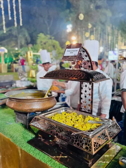 My live station for Chicken Zafrani Tikka Barra, where tender pieces of chicken are cooked in a rich, saffron-infused gravy.