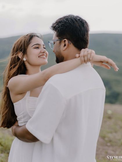 A lovely portrait of the couple embracing, their genuine smiles lighting up the frame.