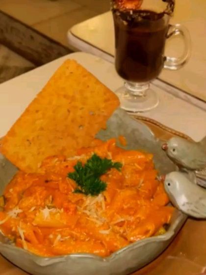 Our creamy pink sauce pasta is a customer favorite. Served with a slice of garlic bread, it's a comforting and flavorful dish perfect for any time of day.