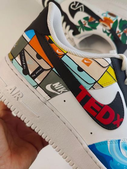 A custom pair of Nikes I painted for a TEDx speaker and emcee, featuring all his passions. This shoe has panels for coffee, Chelsea FC, travel, and of course, his own TEDx achievement.