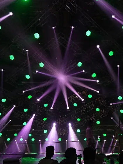 A stunning shot of the lighting rig for the 'Po Po' song from 'Son of Sardar 2', featuring a starburst pattern of beams from Claypaky Mythos fixtures.