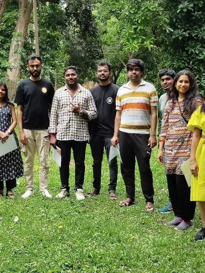 A group photo from our Sunday meetup. A diverse group of people brought together by a shared love for travel.