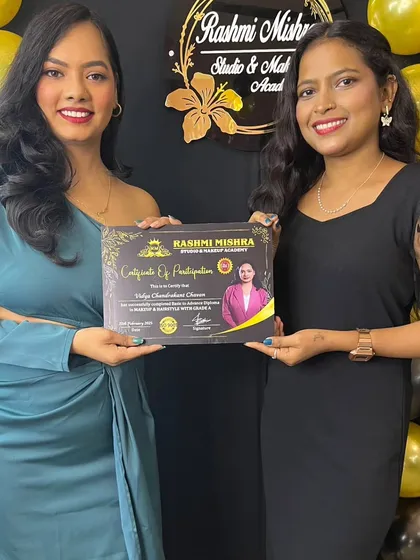 Presenting a certificate to a deserving student. Her hard work and passion for makeup have been truly inspiring.