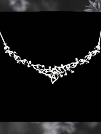 A beautiful, flowing necklace design with marquise and round diamonds. This piece provides significant sparkle and style, making it a great value for your trousseau.