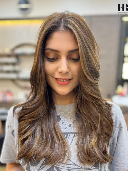 Your hair deserves to be the main event. We created this stunning, sun-kissed look with a custom balayage, blending colours seamlessly for a natural yet glamorous effect that’s perfect for a modern bride.