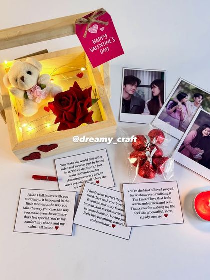 This video shows one of my most popular Valentine's hampers. It includes a wooden box with fairy lights, personal photos, love notes, a teddy, and a candle for a romantic evening.